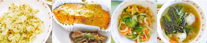 左から炊き込みご飯、鮭のおかず、サラダ、野菜の入った汁物の学校給食の写真
