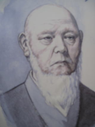 白い髭を長く伸ばした津田仙の肖像画